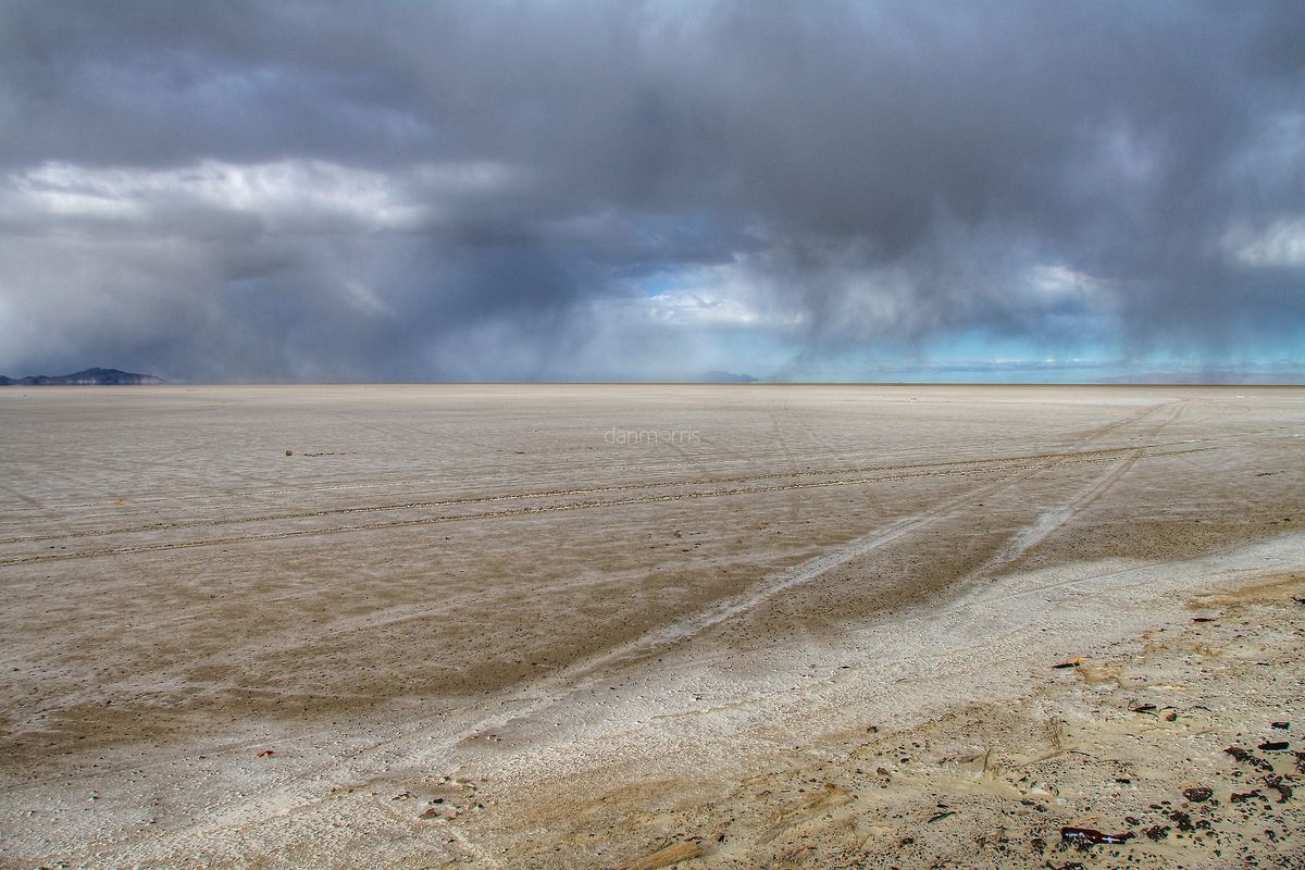 Tire tracks and storm clouds on the Bonneville Salt Flats, Utah (Dan Morris)