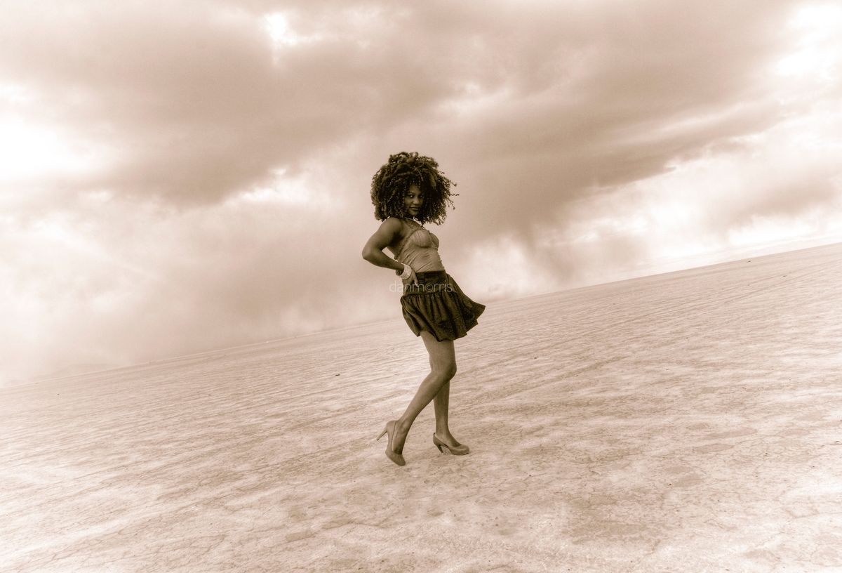 African American woman isolated in Bonneville Salt Flats, Wendover, Nevada (Dan Morris)